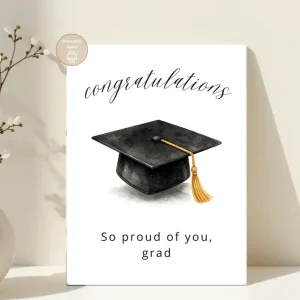 Styled product mockup: A polished printable graduation card for celebrating a graduate with a classic black mortarboard and gold tassel.