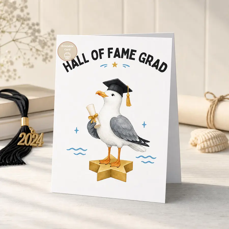 Styled product mockup: TITLE: Graduation Card, Hall Of Fame Grad, Seagull Printable, Digital Download INTRO: A cheerful printable graduation card with a watercolor seagull.